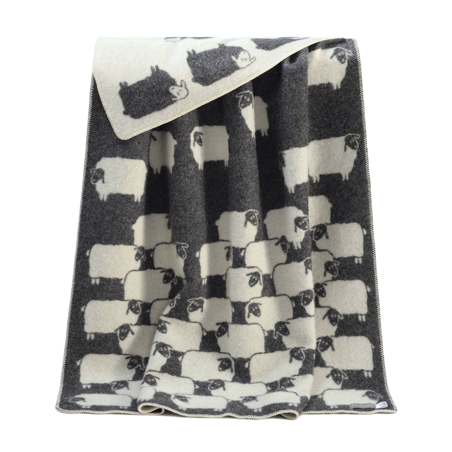 Couverture en laine noire motif mouton